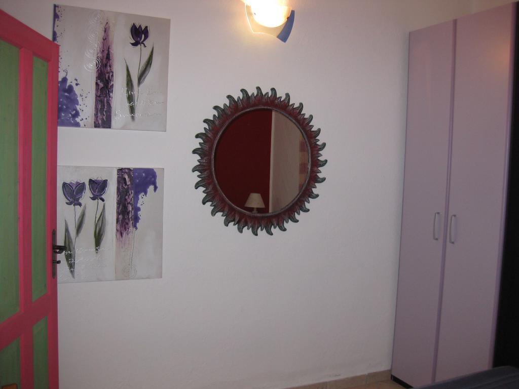 La Casa Felice Appartamenti Chia Room photo