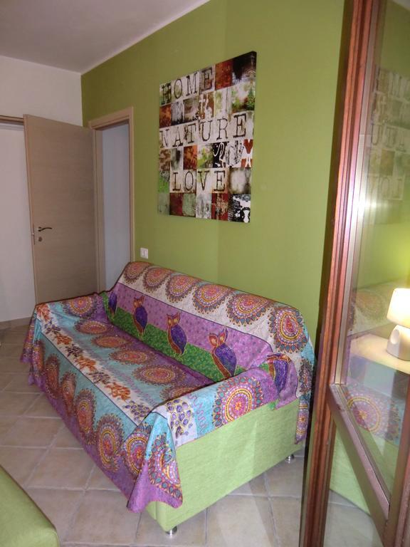 La Casa Felice Appartamenti Chia Room photo